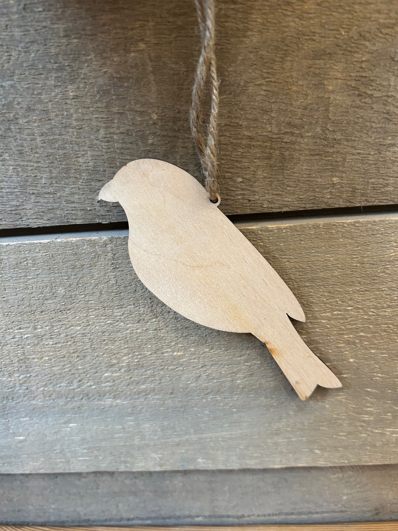Ornement découpé en forme d'oiseau en bois